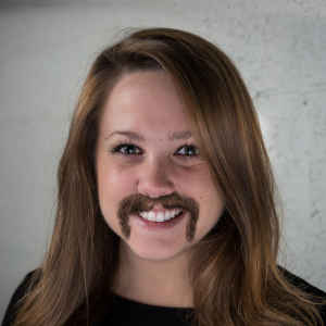 Graphic design employee photograph with mustache