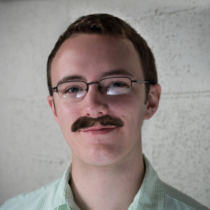 Art Director employee photograph with mustache